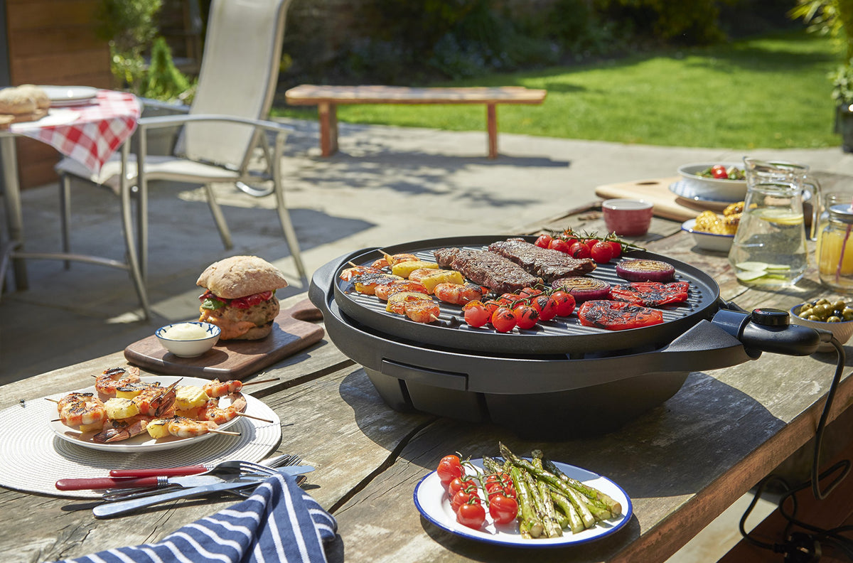 George Foreman Grill 2in1 Elektrogrill [Testsieger]: Standgrill & Tischgrill (Innen- & Außennutzung, Balkon & Küche, Ø44,5cm, Temperaturanzeige, Fettauffangschale, 2400W) Kugelgrill 22460-56, Schwarz